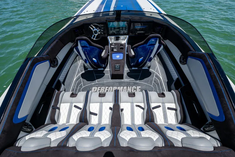  Yacht Photos Pics 2023 Performance Powerboats P360 interior with luxurious seating and modern dashboard on water.