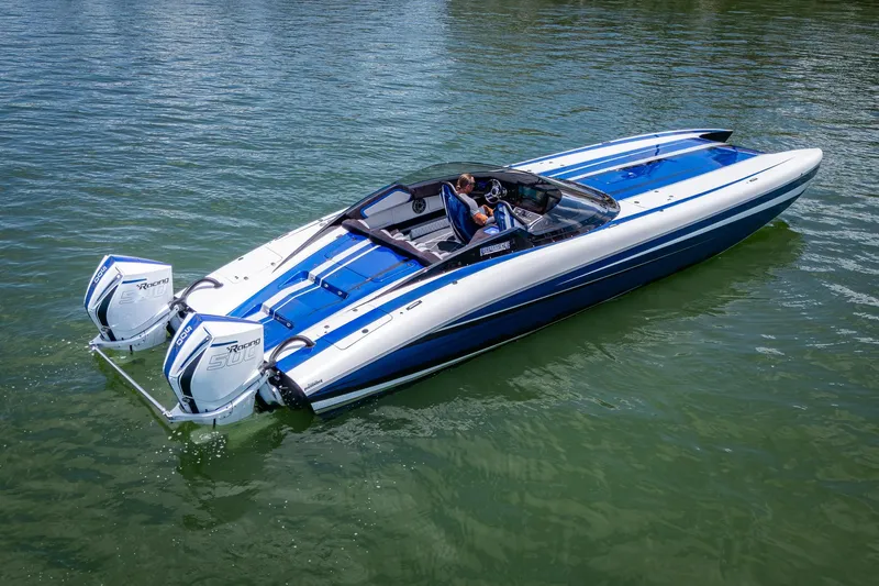  Yacht Photos Pics 2023 Performance Powerboats P360 on water, featuring sleek design and dual outboard engines.