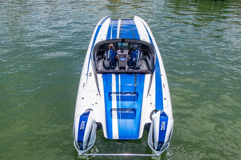  Yacht Photos Pics 2023 Performance Powerboats P360 on water, featuring sleek blue and white design.