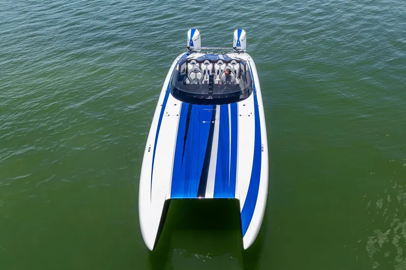  Yacht Photos Pics 2023 Performance Powerboats P360 on water, featuring sleek blue and white design.
