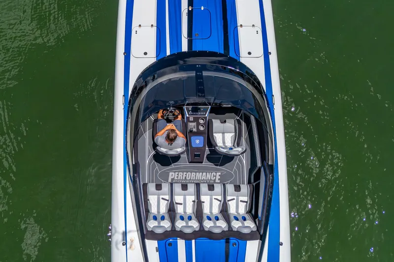  Yacht Photos Pics 2023 Performance Powerboats P360, aerial view, sleek design on green water.