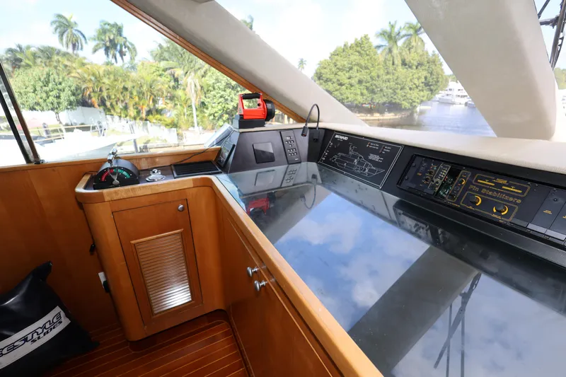 Ocean Drive Yacht Photos Pics 1988 Broward 124 Tri-Deck MY yacht helm with navigation controls and panoramic view.