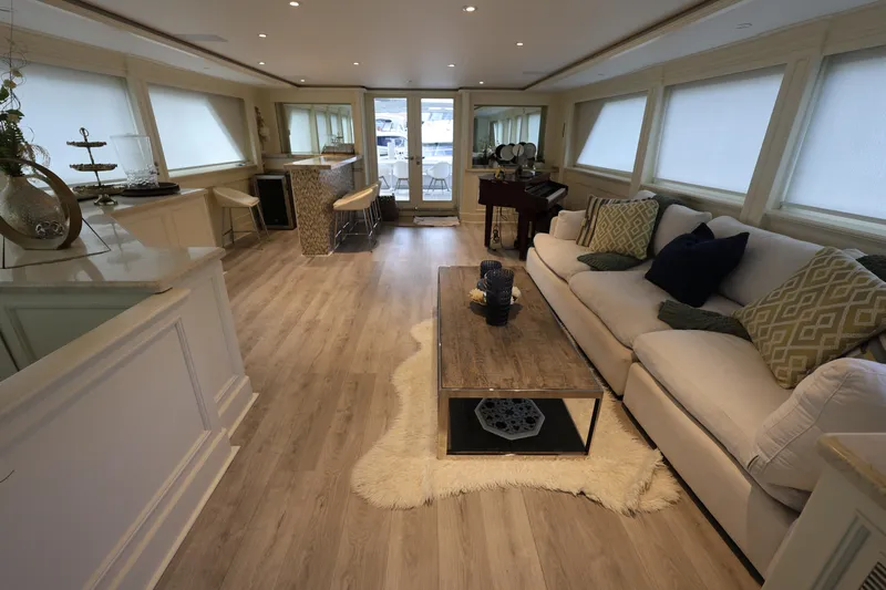 Ocean Drive Yacht Photos Pics Luxurious interior of 1988 Broward 124 Tri-Deck MY yacht with elegant furnishings.