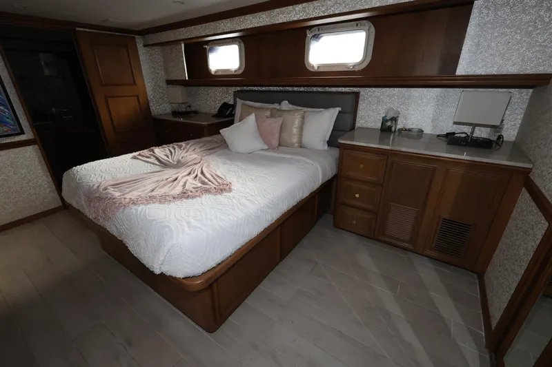 Ocean Drive Yacht Photos Pics Luxurious bedroom interior on 1988 Broward 124 Tri-Deck MY yacht.