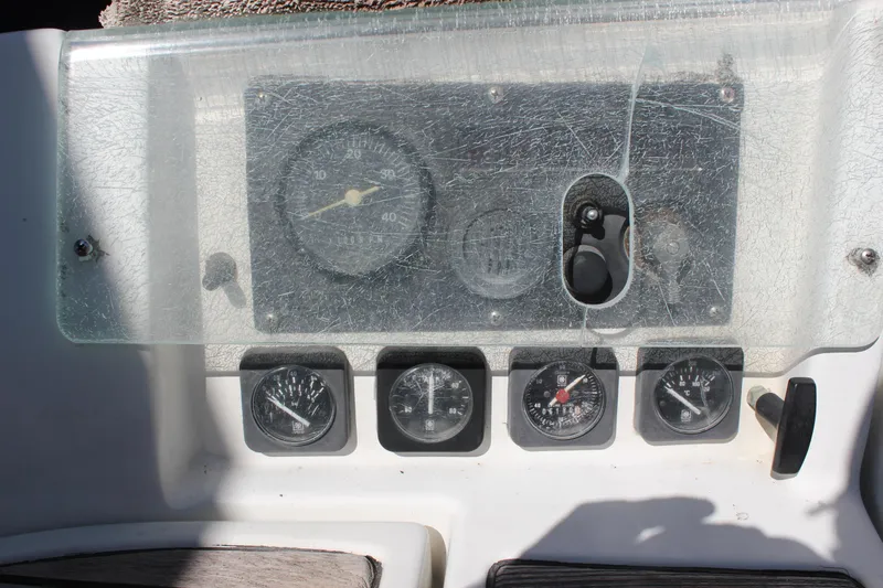 Hawaiian Passage Yacht Photos Pics Dashboard of a 1997 Beneteau Oceanis 461 sailboat with various gauges and controls.