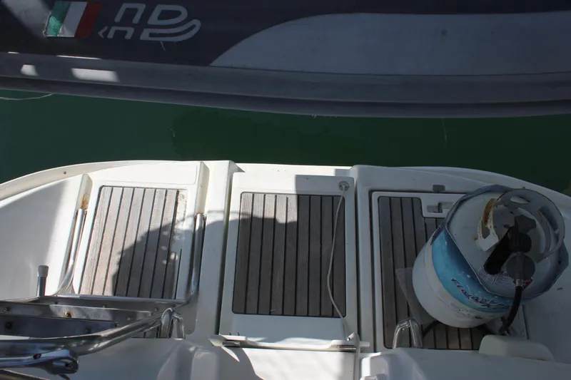 Hawaiian Passage Yacht Photos Pics Beneteau Oceanis 461 yacht deck, 1997 model, featuring wooden panels and equipment.