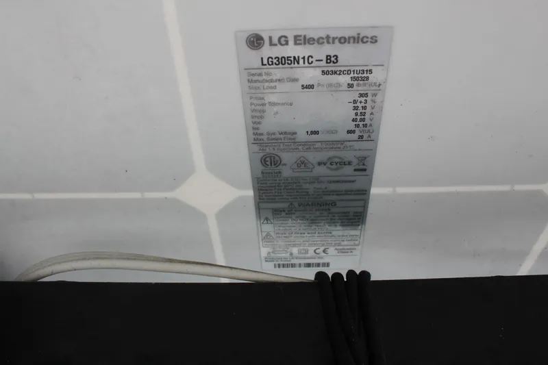 Hawaiian Passage Yacht Photos Pics Label on LG Electronics solar panel, model LG305N1C-B3, with technical specifications.