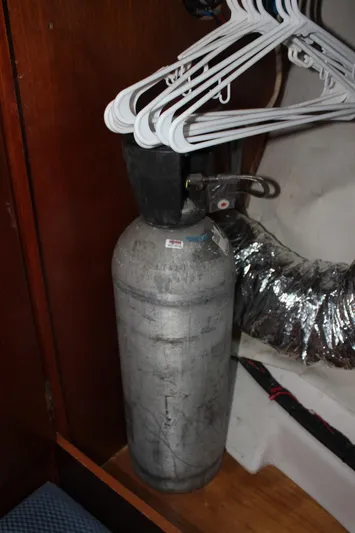 Hawaiian Passage Yacht Photos Pics Fire extinguisher in Beneteau Oceanis 461 yacht closet, 1997 model.