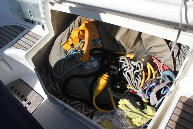 Hawaiian Passage Yacht Photos Pics Storage compartment on 1997 Beneteau Oceanis 461 with ropes and life jacket.