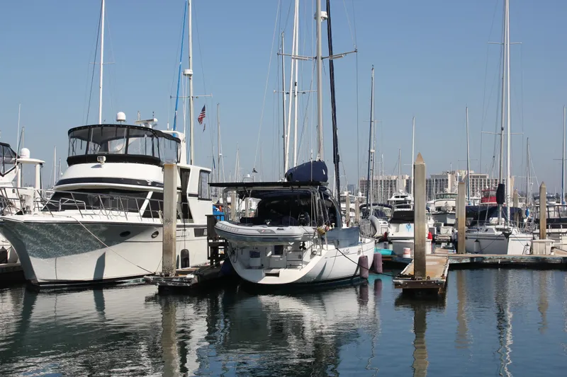 Hawaiian Passage Yacht Photos Pics Sailboats docked at a marina, featuring a 1997 Beneteau Oceanis 461.