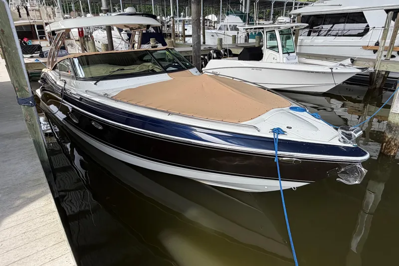  Yacht Photos Pics 2017 Formula 350 Crossover Bowrider docked at marina, covered and secured.