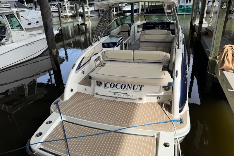  Yacht Photos Pics 2017 Formula 350 Crossover Bowrider docked, featuring spacious seating and elegant design.