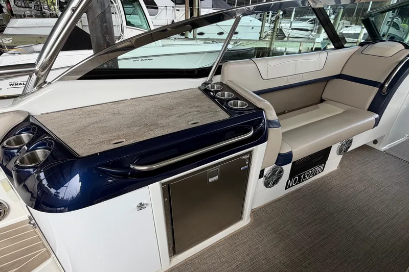  Yacht Photos Pics 2017 Formula 350 Crossover Bowrider interior with seating, cup holders, and storage.