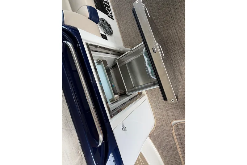  Yacht Photos Pics 2017 Formula 350 Crossover Bowrider interior with open storage compartment.