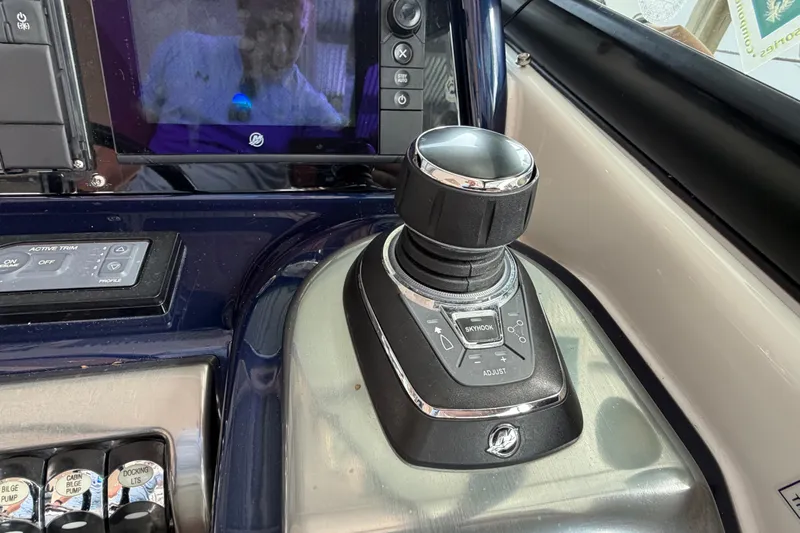  Yacht Photos Pics Control panel of a 2017 Formula 350 Crossover Bowrider boat with joystick and display.