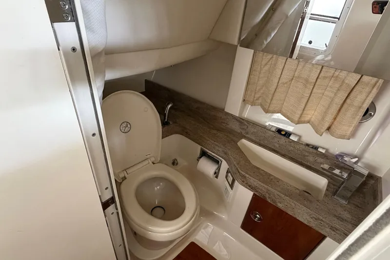  Yacht Photos Pics 2017 Formula 350 Crossover Bowrider bathroom with toilet, sink, and countertop.
