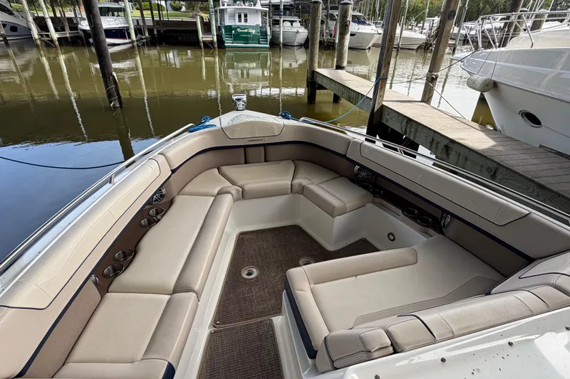  Yacht Photos Pics 2017 Formula 350 Crossover Bowrider interior with spacious seating at marina.