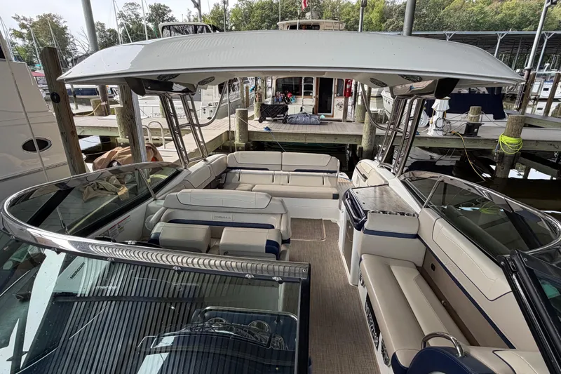  Yacht Photos Pics 2017 Formula 350 Crossover Bowrider docked, showcasing spacious seating and sleek design.