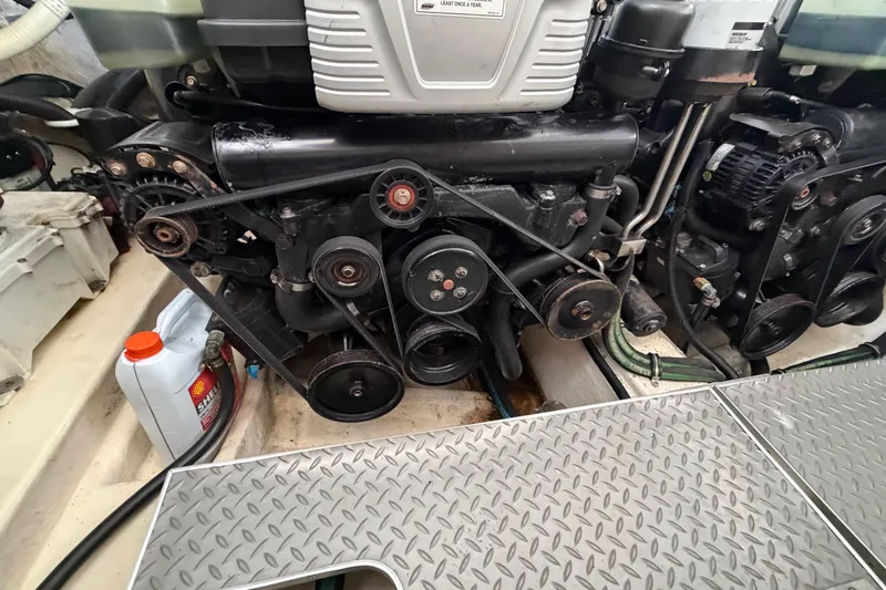  Yacht Photos Pics Engine compartment of a 2017 Formula 350 Crossover Bowrider with visible belts and components.
