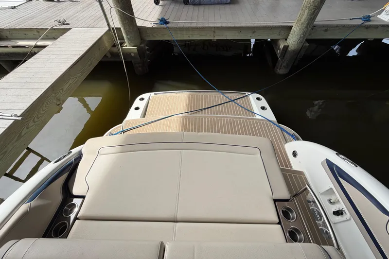  Yacht Photos Pics 2017 Formula 350 Crossover Bowrider docked, showcasing spacious rear seating and swim platform.