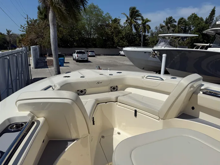  Yacht Photos Pics 2025 Scout 305 LXF boat interior with luxurious seating and modern design.