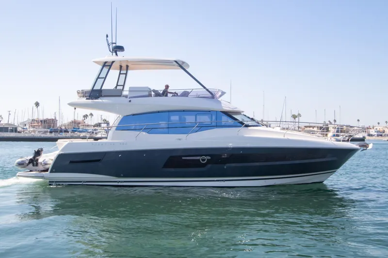 Fantasea Yacht Photos Pics 2020 Prestige 460 Fly yacht cruising in a marina.