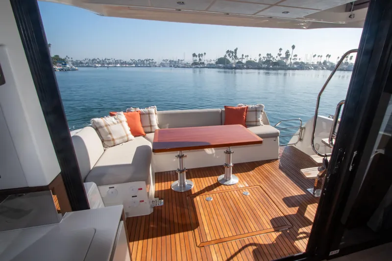 Fantasea Yacht Photos Pics Prestige 460 Fly 2020 yacht with outdoor seating area and scenic water view.