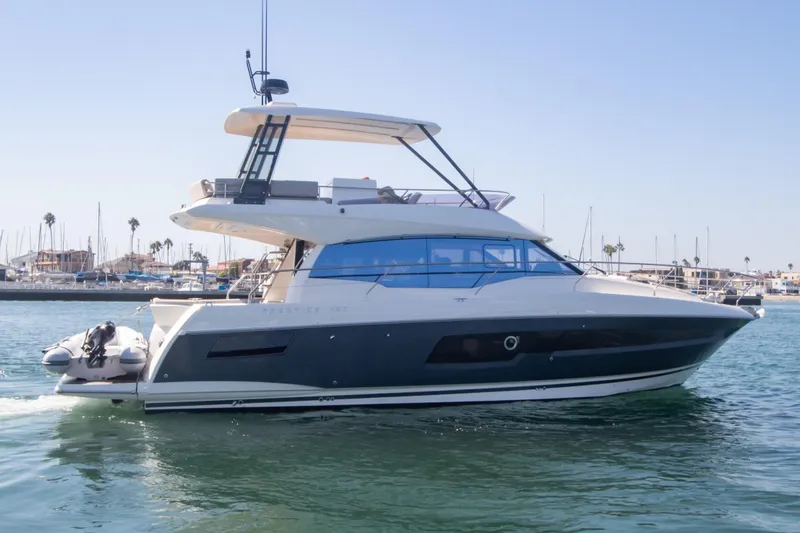 Fantasea Yacht Photos Pics 2020 Prestige 460 Fly yacht cruising in a marina.