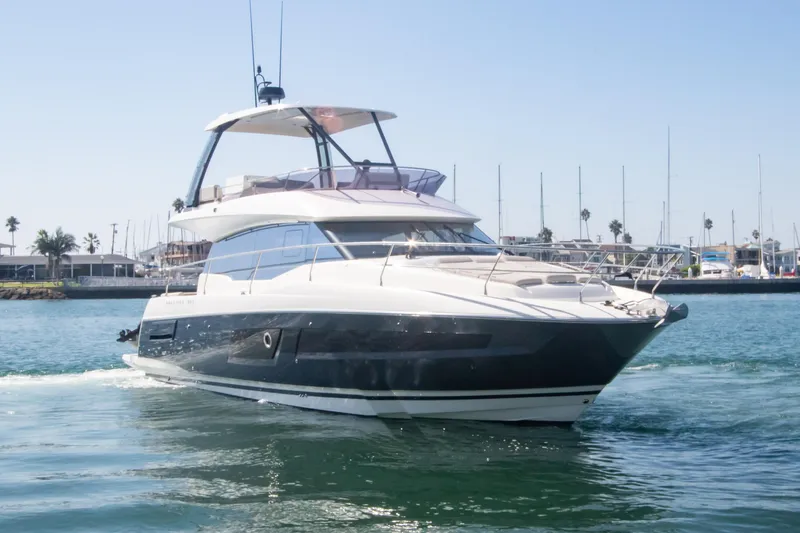 Fantasea Yacht Photos Pics 2020 Prestige 460 Fly yacht cruising in a marina.