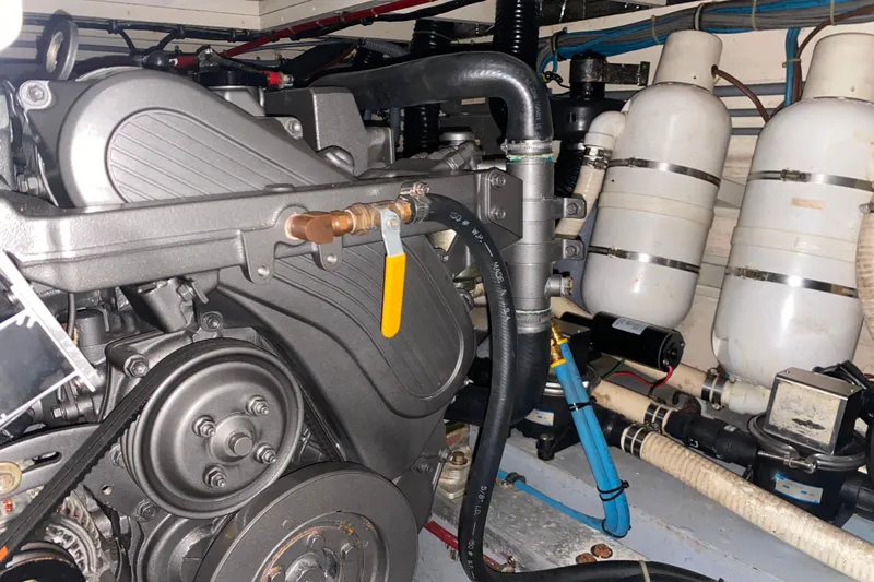  Yacht Photos Pics Engine room of 1988 Hatteras 40 Double Cabin with visible machinery and components.