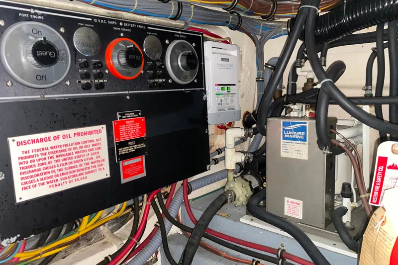 Yacht Photos Pics Electrical panel and equipment in 1988 Hatteras 40 Double Cabin engine room.
