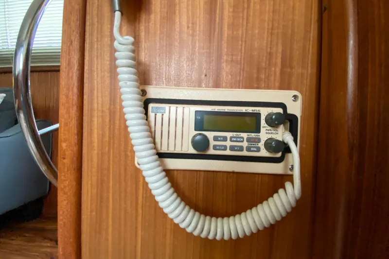  Yacht Photos Pics VHF marine transceiver IC-M56 on 1988 Hatteras 40 Double Cabin yacht interior.