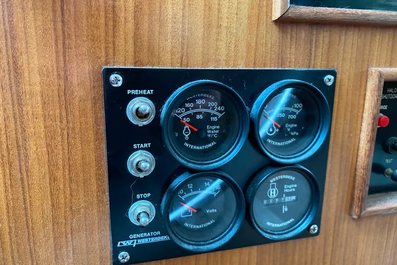  Yacht Photos Pics Control panel of a 1988 Hatteras 40 Double Cabin boat with gauges and switches.