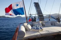 Luxurious 2020 Custom Schooner with Panama flag, ocean view, and plush seating.
