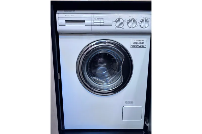 Hustler I Yacht Photos Pics Front-loading washing machine in a Sea Ray 560 Sedan Bridge yacht, 2000 model.