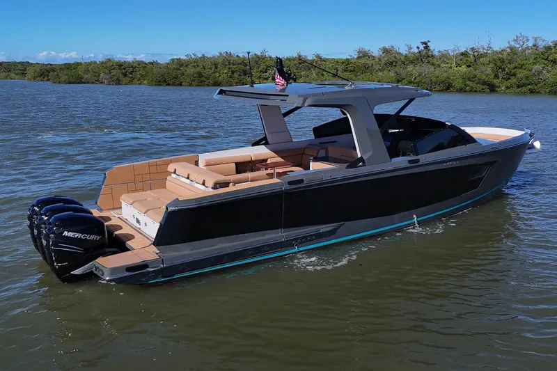  Yacht Photos Pics 2022 Aviara AV40 OB luxury boat on calm water, featuring sleek design and powerful Mercury engines.