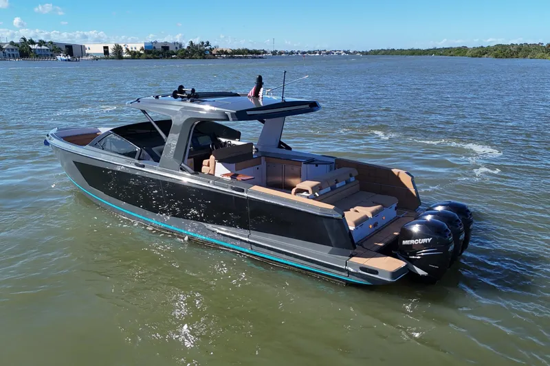  Yacht Photos Pics 2022 Aviara AV40 OB luxury boat cruising on a sunny day.