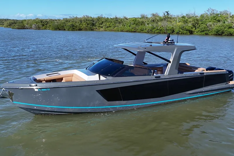  Yacht Photos Pics 2022 Aviara AV40 OB luxury boat on calm water, featuring sleek design and modern amenities.