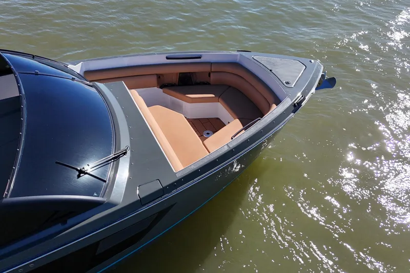  Yacht Photos Pics 2022 Aviara AV40 OB boat with sleek design and spacious seating on water.