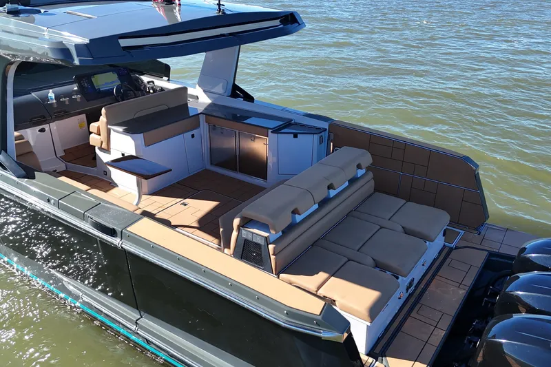  Yacht Photos Pics 2022 Aviara AV40 OB luxury boat with spacious seating and modern design on the water.