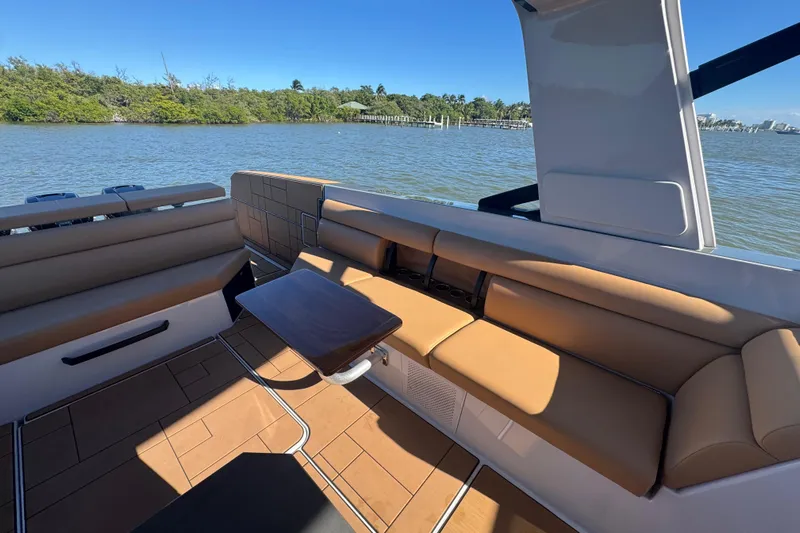  Yacht Photos Pics Luxurious seating area on 2022 Aviara AV40 OB boat, with scenic water view.