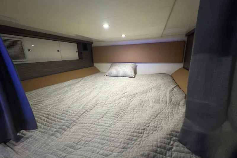  Yacht Photos Pics 2022 Aviara AV40 OB cabin interior with cozy bed and modern design.