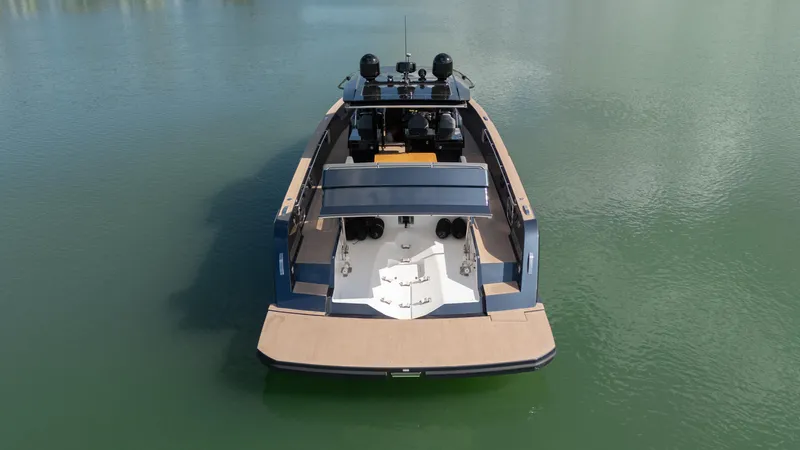  Yacht Photos Pics 2025 Pardo Yachts 50, luxury yacht on calm water, rear view.