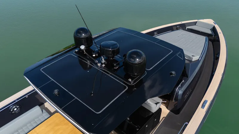  Yacht Photos Pics 2025 Pardo Yachts 50, sleek black deck, modern design, luxury yacht on calm water.