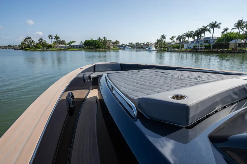  Yacht Photos Pics 2025 Pardo Yachts 50 on serene water with luxurious deck and sunbed.