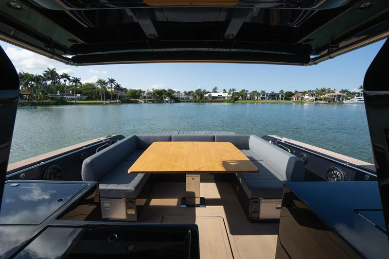  Yacht Photos Pics Luxurious 2025 Pardo Yachts 50 interior with elegant seating and scenic waterfront view.