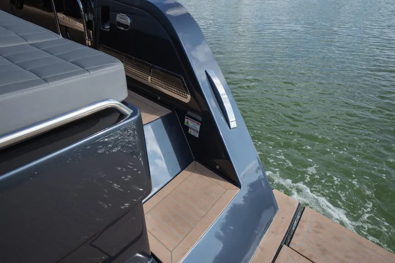  Yacht Photos Pics Sleek 2025 Pardo Yachts 50 with modern design, docked on calm water.