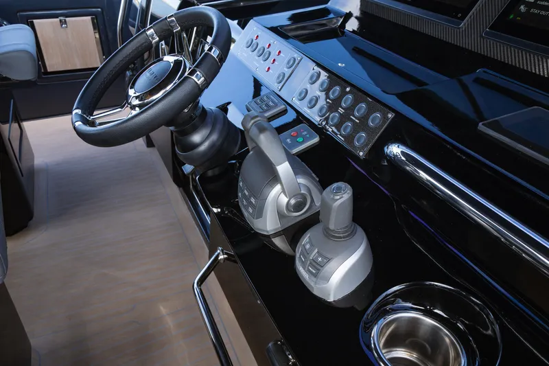  Yacht Photos Pics Helm of 2025 Pardo Yachts 50, featuring modern controls and sleek design.