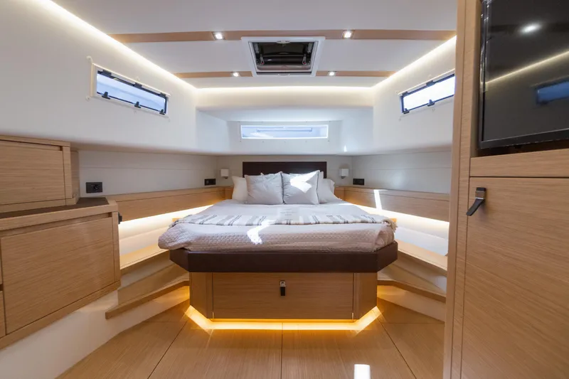  Yacht Photos Pics Luxurious cabin interior of 2025 Pardo Yachts 50, featuring modern design and ambient lighting.