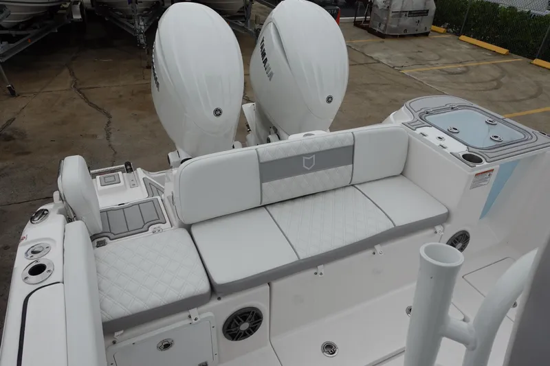  Yacht Photos Pics 2025 Sea Fox 268 Commander boat with dual engines and cushioned seating.